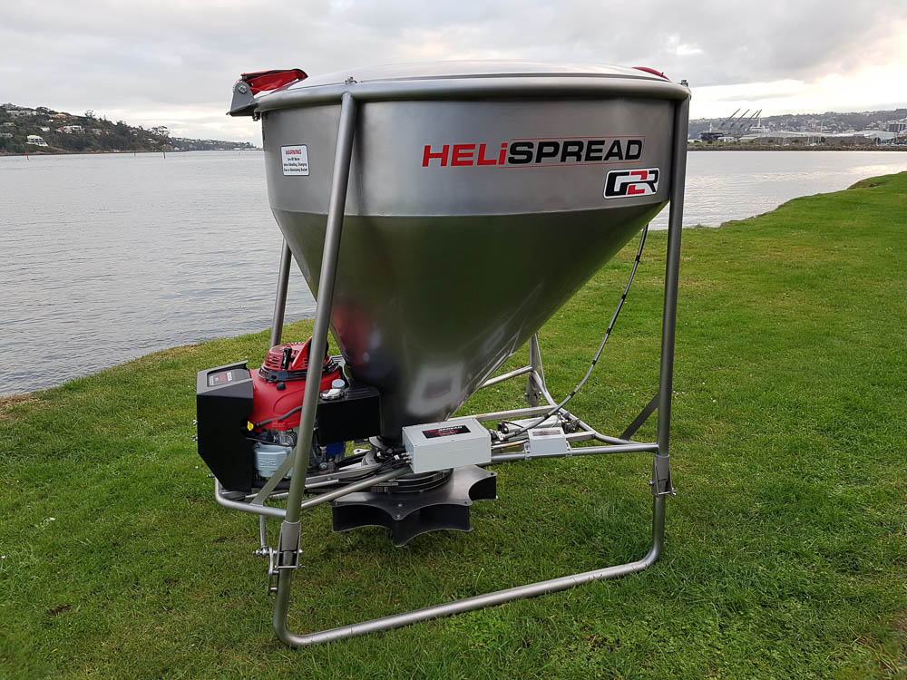 Helispread helicopter spreading equipment in operation — image 1